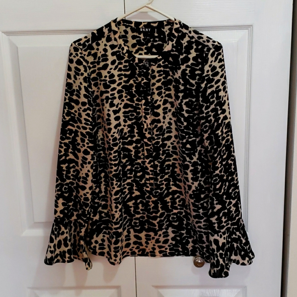 Black and cream ruffled cuff blouse. Great update to any closet